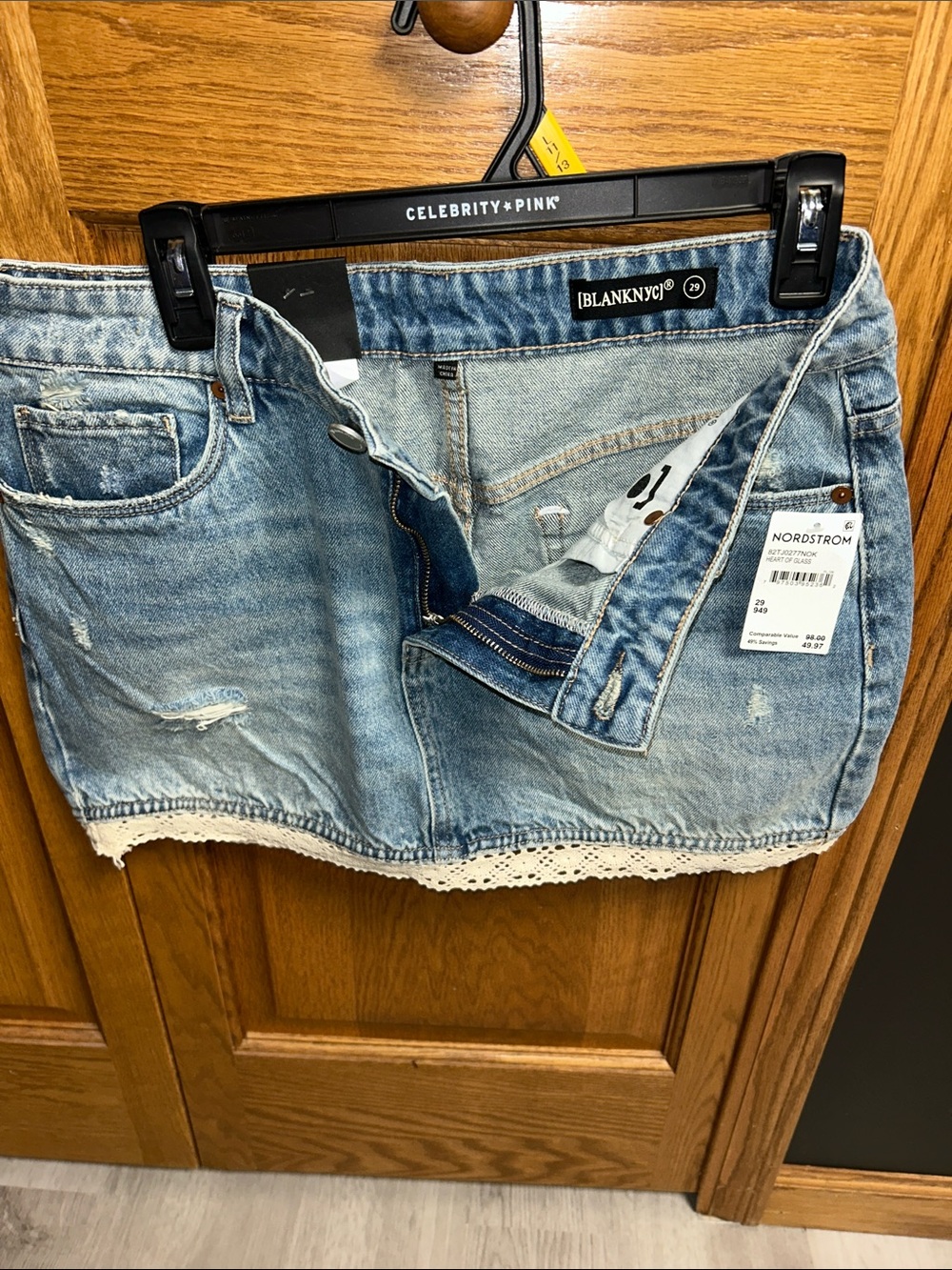 Blank NYC Light Blue Distressed Denim Mini Skirt with Crochet Trim